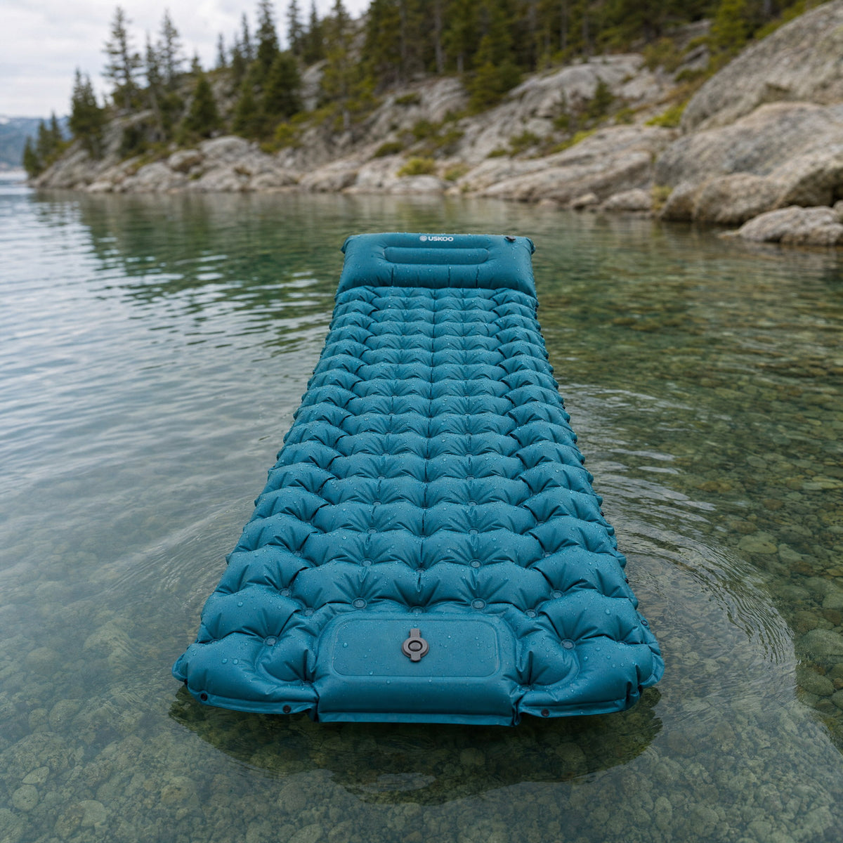 Uskoo AirFlex floating on an alpine lake Image