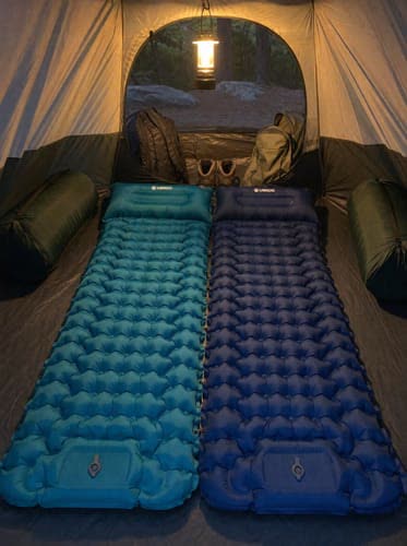 Customer photo: turquoise and navy Uskoo AirFlex pads clipped together inside a tent