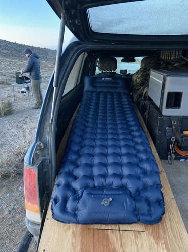 Customer photo: navy Uskoo AirFlex pad set up in the back of an overlanding truck